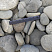 Kamenclub.ru: Галька речная плоская (серо-белая) фр. 70-120 мм. купить  в Махачкале галька галечник речной серый, белый окатанная плоская  природная галька 9000 руб/т   фото КАМЕНЬ КЛУБ